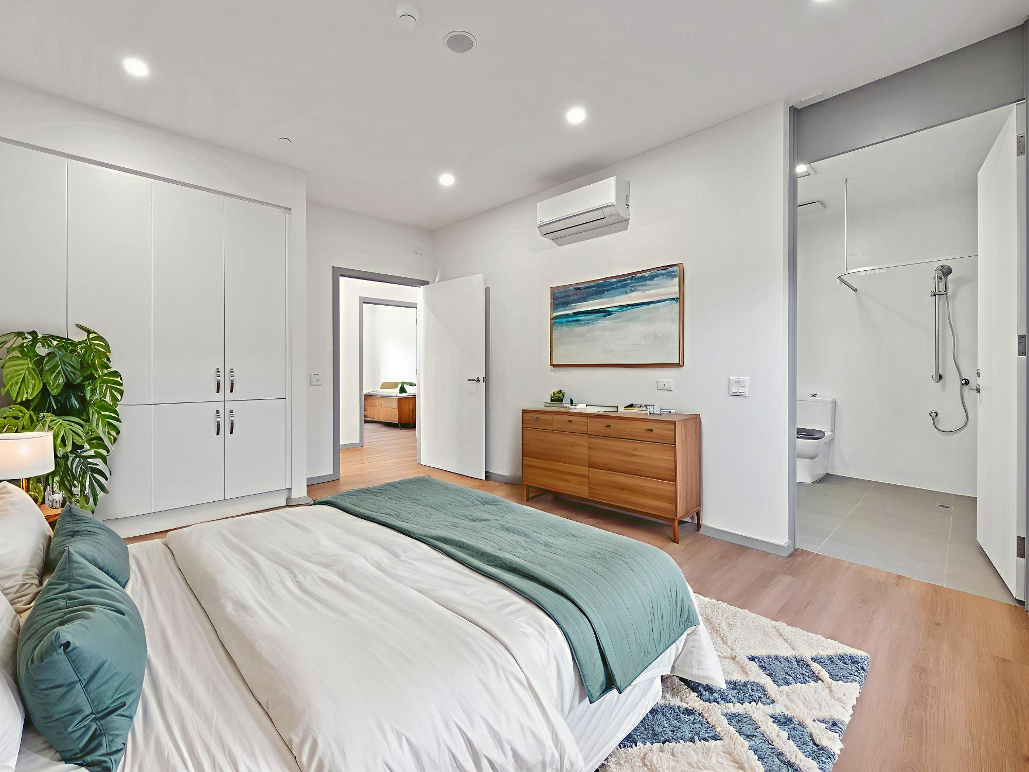 Fleet Unit A Bedroom into Ensuite 1 LR No Logo STAGED