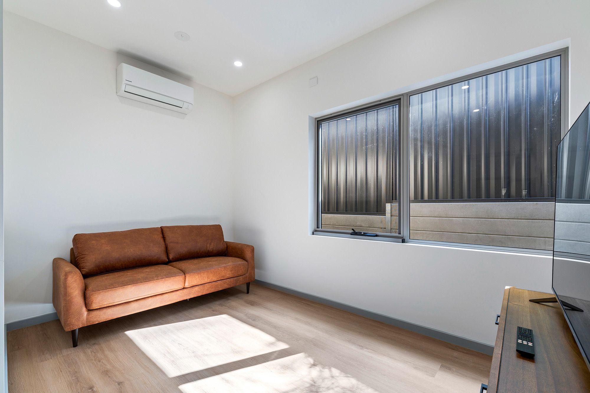 Clement TV Room LR No Logo