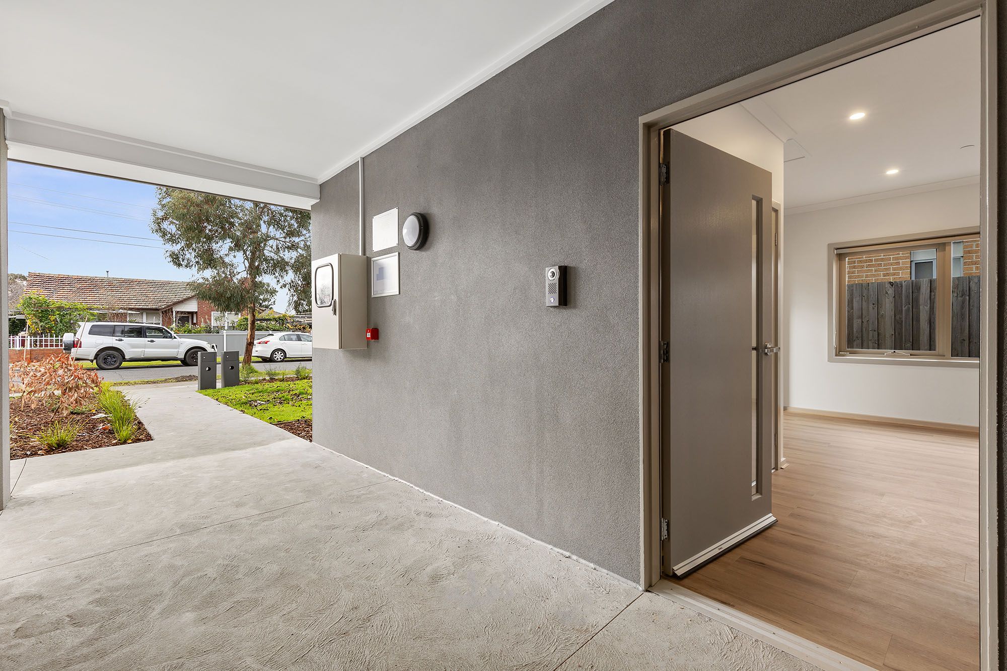 Freda Unit 1 Porch and Entrance LR No Logo
