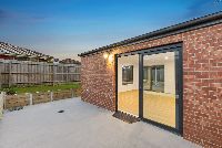 Thanos   Unit 1 Backyard 2 Dusk LR No Logo