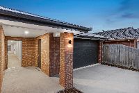 Thanos   Unit 1 Entrance and Garage Dusk LR No Logo