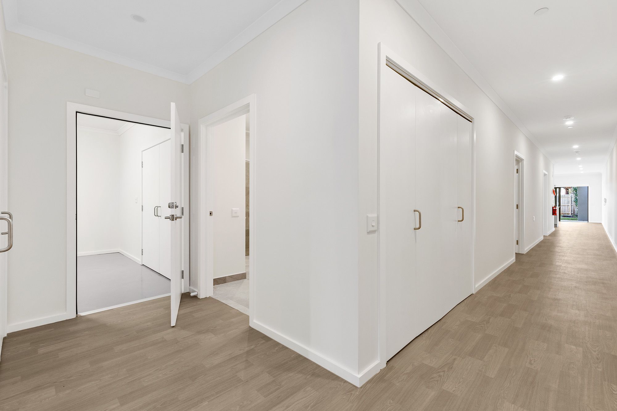 Rowans Hallway into Garage and OOA Bathroom LR No Logo