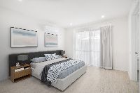 stage bedroom   bed bedside table lamp picture on wall