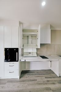 Drop down cupboard