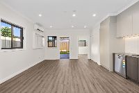 Rogers   Unit 4 Kitchen Living Dining Backyard and Bedroom 2 LR No Logo