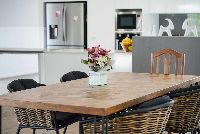 the Hamptons inspired styling gives the homes a warm and welcoming feel