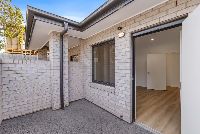 John   Dwelling 1 Courtyard into Bedroom 1 LR No Logo