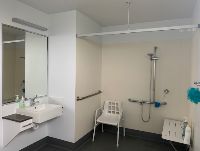 bathroom with shower for listing