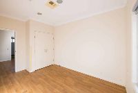 Alternate view-of-unit-1s-bedroom-with-view-of-the-cupboard