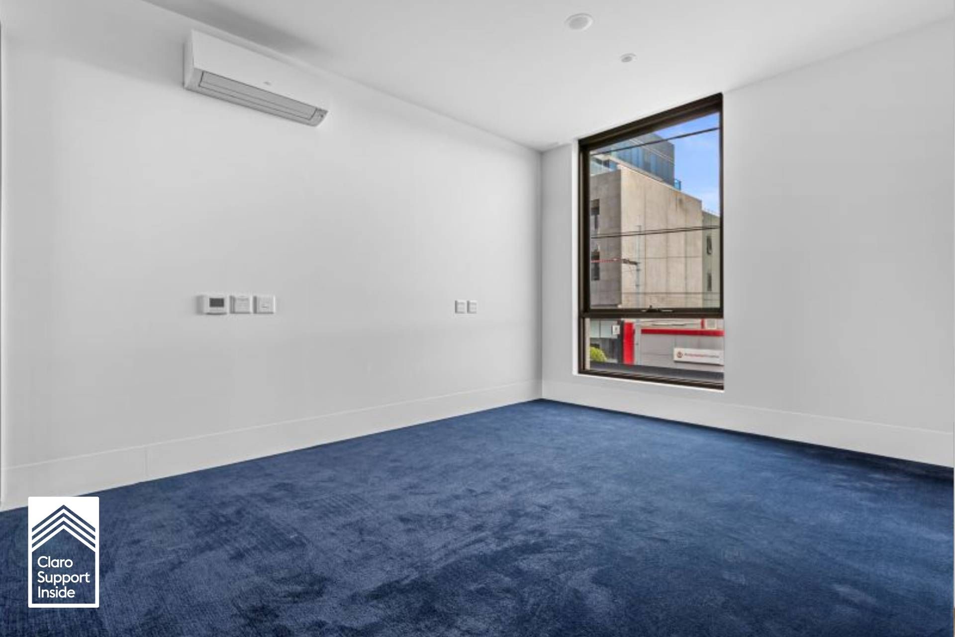 bedroom with blue carpet