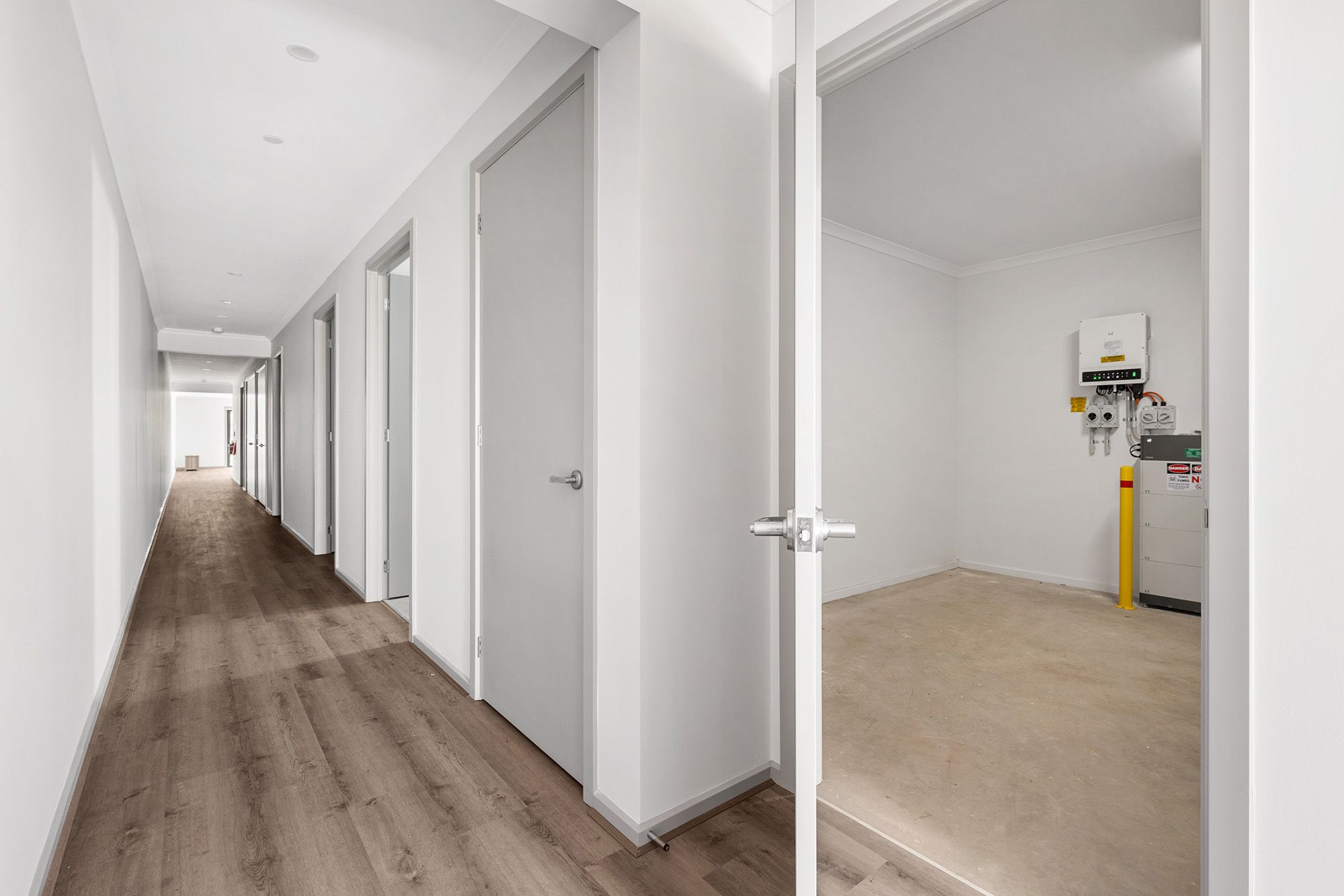 CedarTho   Hallway into Garage LR No Logo