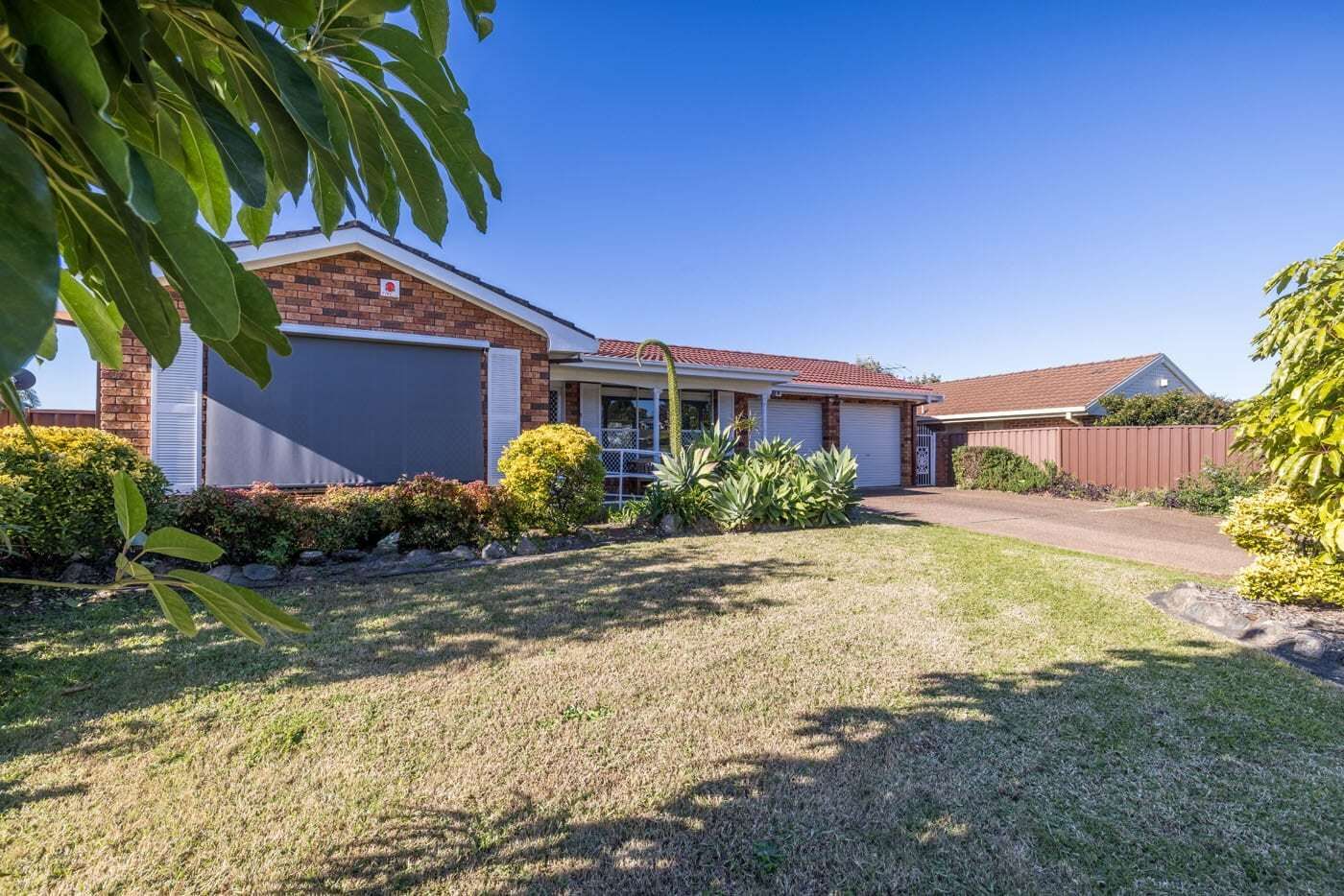 View of-front-of-home-and-lawn