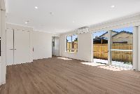 Langford   Unit 2 Living Dining onto Courtyard LR No Logo