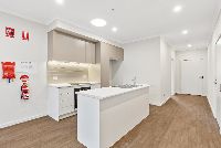 Maude   Dwelling 1 Kitchen and Hallway LR No Logo