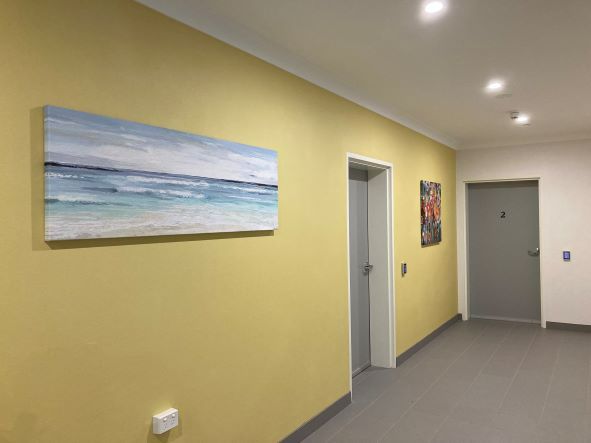 Ground floor hallway with art