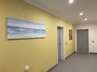 Ground floor hallway with art