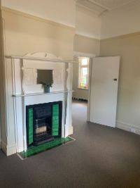 front right bed room fire place 1